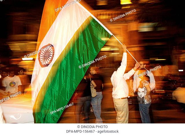 Thousands of Mumbaikars took part in mass protest march at Gateway-of-India after terrorist attack by Deccan Mujahedeen on 26th November 2008 in Bombay Mumbai ;...