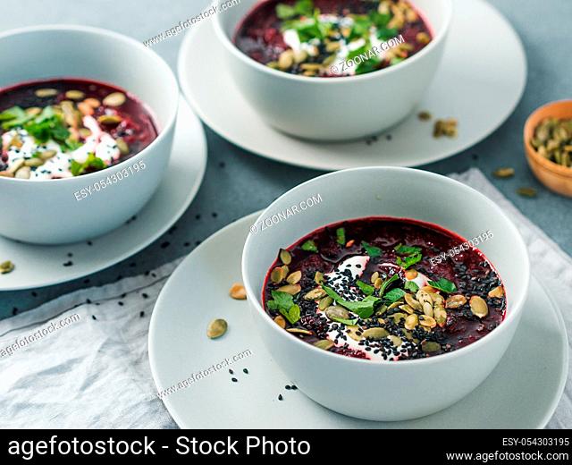 Ideas and recipes for healthy soup - Beetroot and ginger soup puree. Clean eating, detox, vegetarian diet concept. Plates with perfect beet soup