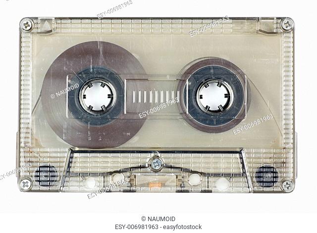 Used vintage transparent Compact Cassette on white background