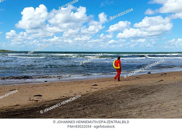 A life saver can be seen at the Tylösand beach in Halmstad, Sweden, as seen on 11 August 2016. Photo: Johannes Hennemuth/dpa.