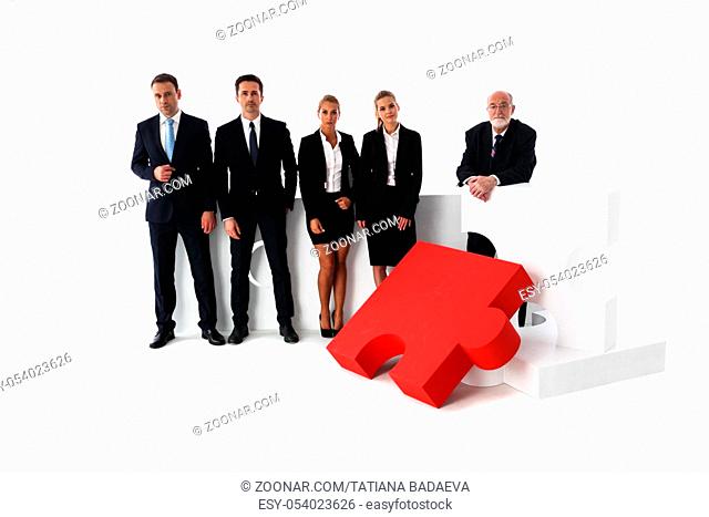 Business team portrait and big puzzle isolated on white background