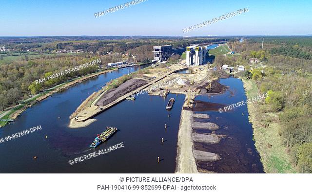 15 April 2019, Brandenburg, Niederfinow: View of the construction site of the new ship's hoist (r) and of the old hoist, aerial view with a drone