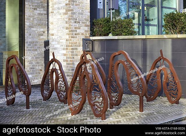 Detail of sculptural bike rack outside entrance. Cumberland Place, Southampton, United Kingdom. Architect: O'Connell East Architects, 2019