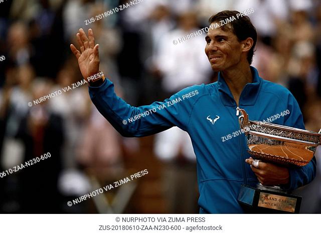 June 10, 2018 - Paris, Ile-de-France, France - Rafael Nadal of Spain poses with the trophy after beating Dominic Thiem of Austria 6-4 6-3 6-2 in the final of...