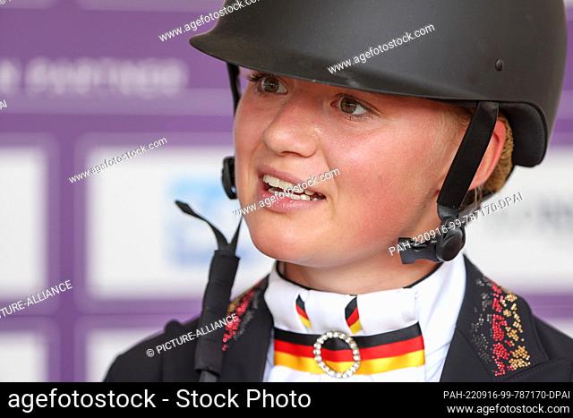 16 September 2022, Italy, Rocca Di Papa: Equestrian sport: world championship, eventing, dressage. Eventing rider Alina Dibowski (Germany) speaks at a press...