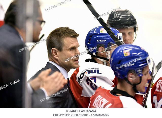Czech head coach Vaclav Varada, centre, and his assistant Partik Elias, left, during the 2020 IIHF World Junior Ice Hockey Championships Group B match between...