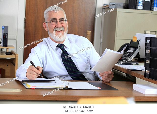 Caucasian businessman working in office