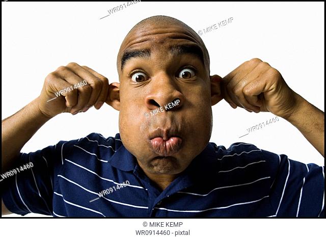 Man making a funny face, Stock Photo, Picture And Royalty Free Image. Pic.  WR0914460 | agefotostock