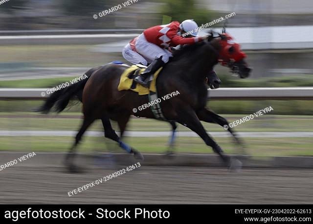 MEXICO CITY, MEXICO - APR 23, 2022: A Jockey during a horse race as part to Botarga contest at the Hipódromo de las Américas