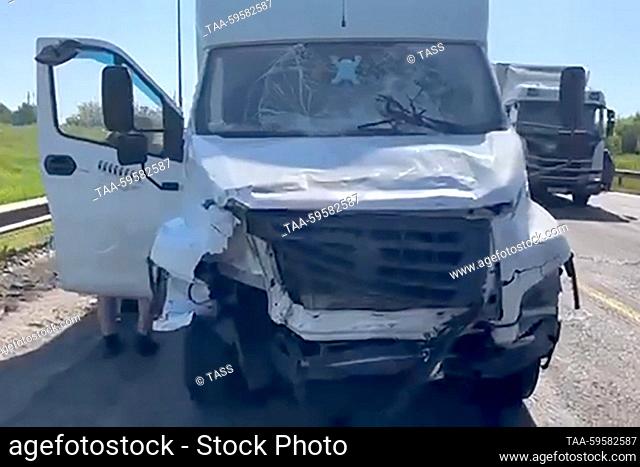 RUSSIA, NIZHNY NOVGOROD REGION - JUNE 3, 2023: The site of a crash of a Nissan car and a GAZelle truck. Casualties have been reported. Video grab