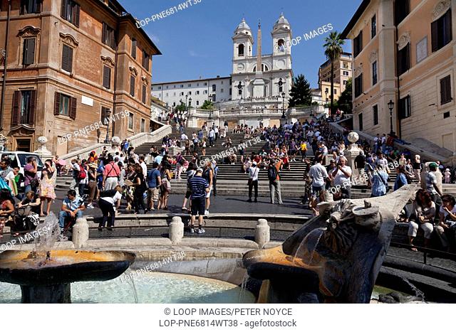 The spanish steps and the Santissima Trinita dei Monti covered in tourists