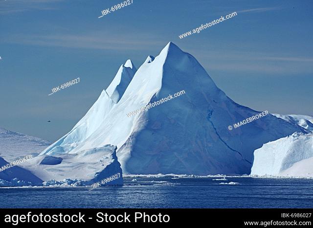 Huge icebergs and drift ice, seagulls, winter, Disko Bay, Ilulissat, West Greenland, Denmark, Europe