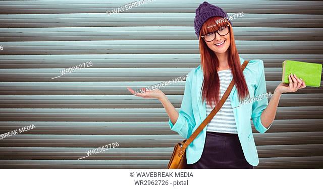 Redhead woman gesturing against wall
