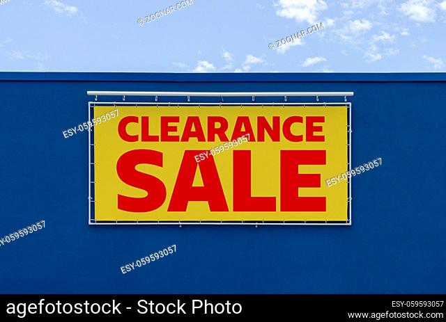 Clearance sale written on a billboard