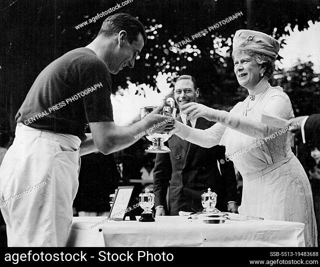 Queen Presents Duke's Cup To Navy -- Her Majesty The Queen, at Ranelagh presenting to the Royal Navy team, who beat the R.A.P