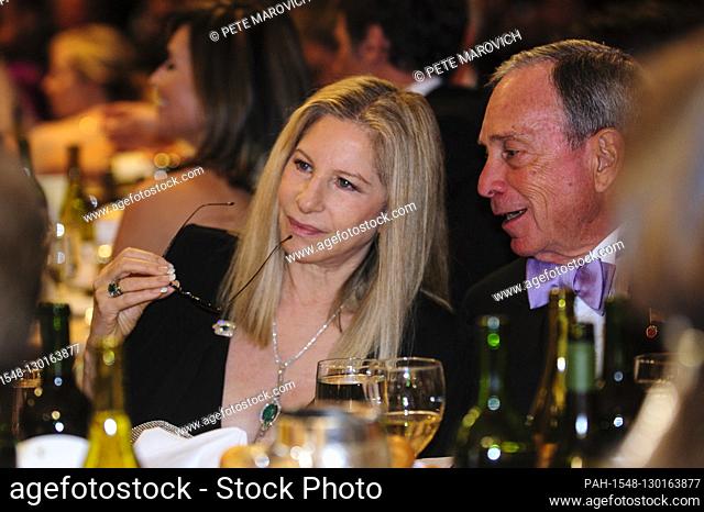 New York Mayor Michael Bloomberg talks with actress Barbara Streisand at the White House Correspondents' Association (WHCA) annual dinner in Washington