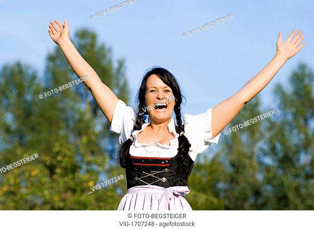 young, lucky woman in dirndl - 06/10/2009