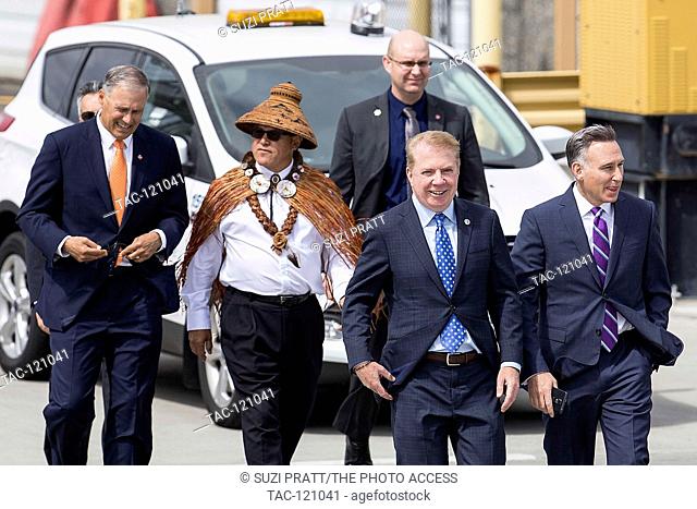 (L-R) Seattle Governor Jay Inslee, President of the National Congress of American Indians Brian Cladoosby, Seattle Mayor Ed Murray
