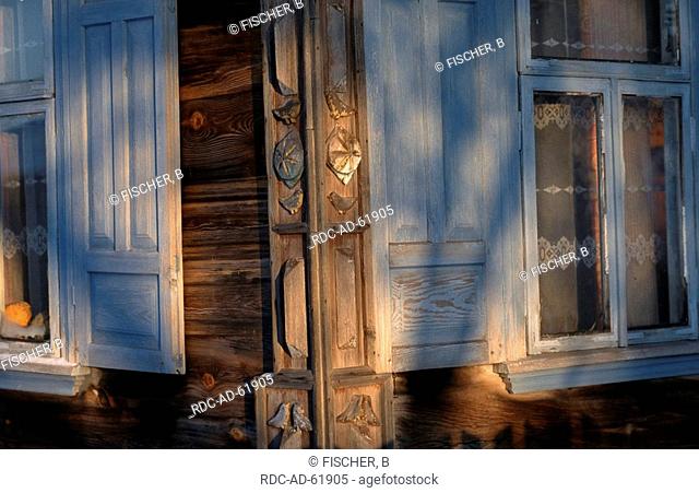 Woodcarving an wooden house Bialowiecza Poland