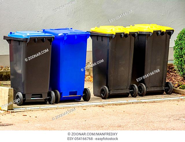 Row of garbage cans for wate separation and recycling