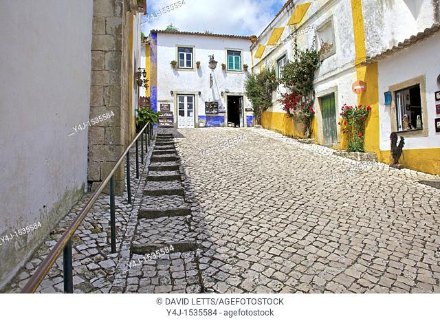 Medieval Cobblestone Street in the Fortified Walled European Village of Obidos