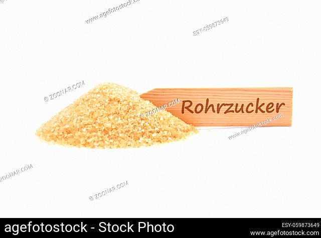 Brauner Rohrzucker - Brown cane sugar at plate