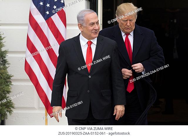 March 25, 2019 - Washington, District of Columbia, U.S. - US President Donald J. Trump (R) greets Prime Minister of Israel Benjamin Netanyahu (L) at the South...
