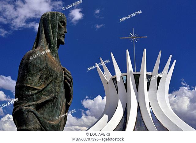 Brazil, Brazil, detail of the cathedral Nossa Senhora de Aparecida with evangelist in the foreground, designed by Oscar Niemeyer