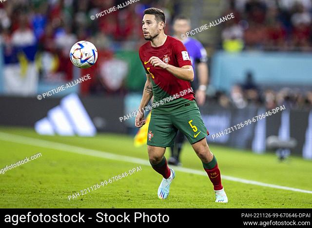 24 November 2022, Qatar, Doha: Soccer: World Cup, Portugal - Ghana, Preliminary round, Group H, Matchday 1, Stadium 974, Portugal's Raphael Guerreiro in action