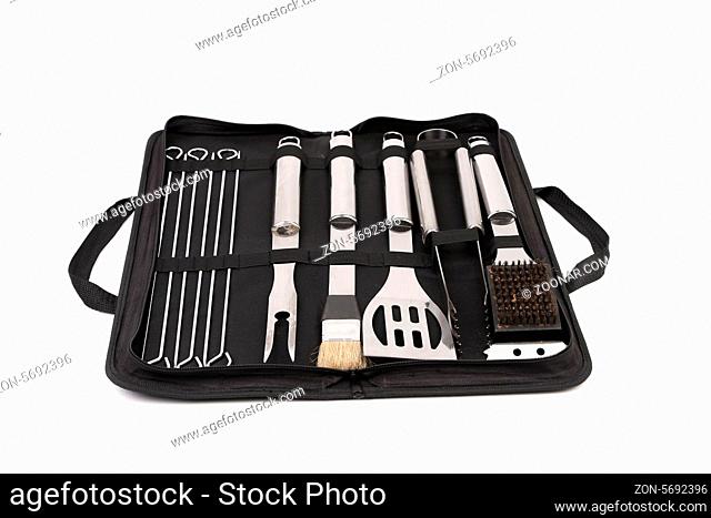 Set of tools for bbq in black bag. White background