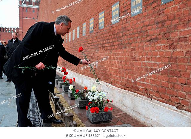 At the Kremlin Wall in Moscow, Expedition 3940 Soyuz Commander Alexander Skvortsov of Roscosmos lays flowers in a tribute to Russian space icons who are...
