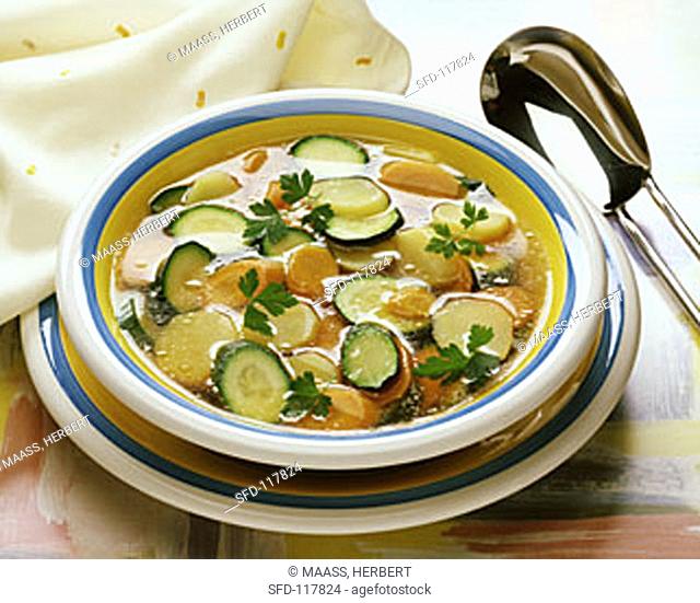 Vegetable broth with potatoes, courgettes and carrots