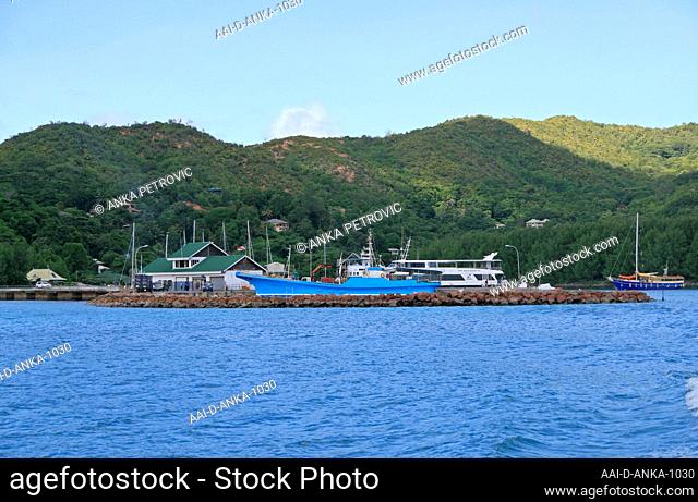 Ships, boats and yachts parked at harbour port, St Anne's Bay, Praslin Island, Seychelles