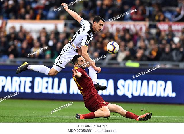 Roma football player Kostas Manolas and the Udinese football player Kevin Lasagna during the match Roma-Udinese in the Olimpic Stadium