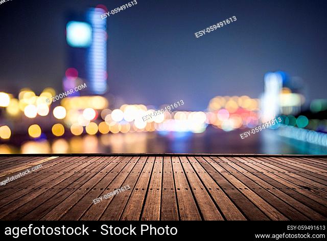 wooden platform and lights of night, shagnhai china