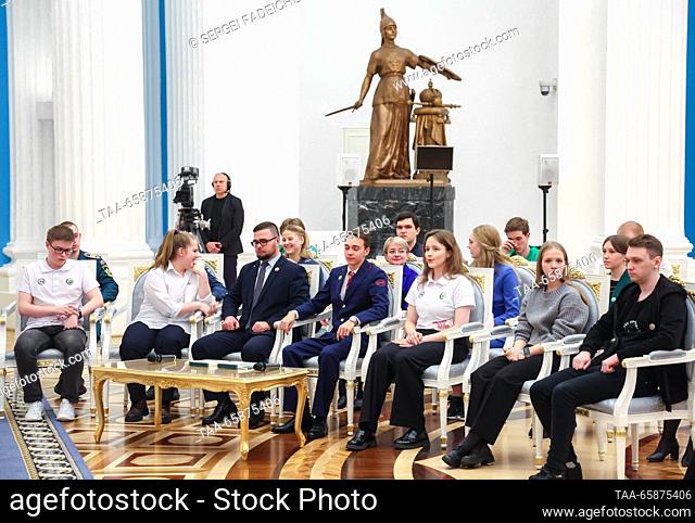 RUSSIA, MOSCOW - DECEMBER 18, 2023: Winners and mentors of the Professionals national professional skills championship attend a meeting with Russia's President...