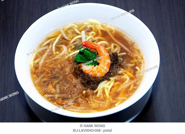 High angle view of prawn and noodle soup