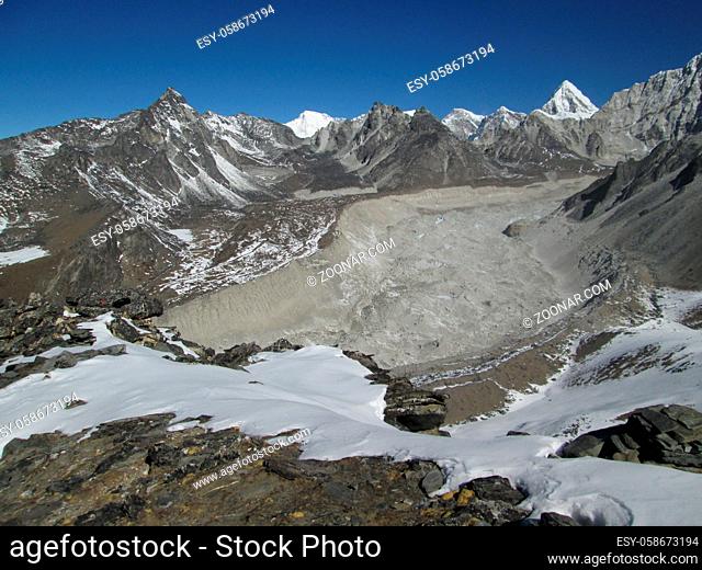 Nuptse Glacier, moraines and peak of Pumo Ri
