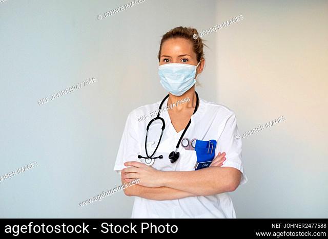 Female doctor wearing face mask