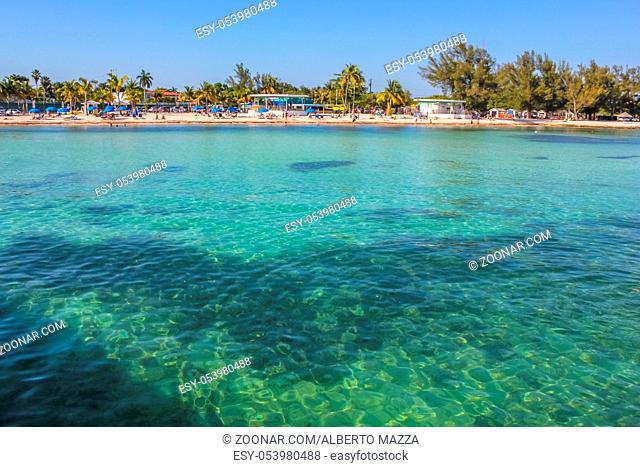 Tropical sea of Higgs Beach, a popular Key West beach in Florida known for snorkeling, turquoise waters and white sand. Summer vacation in the tropics