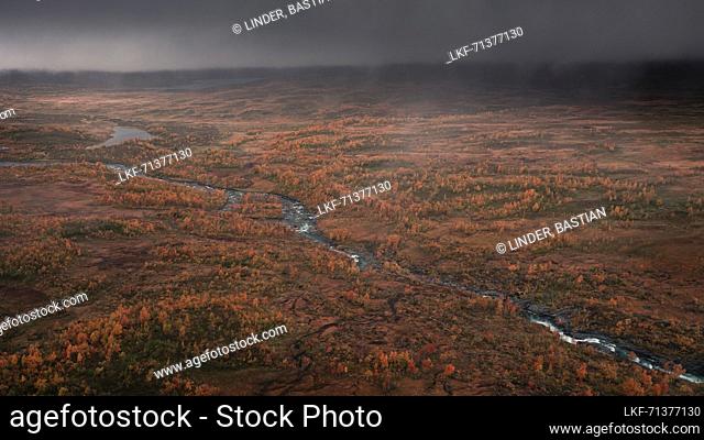 River along the Wilderness Road, on the Vildmarksvagen plateau in JÃ¤mtland in autumn in Sweden from above