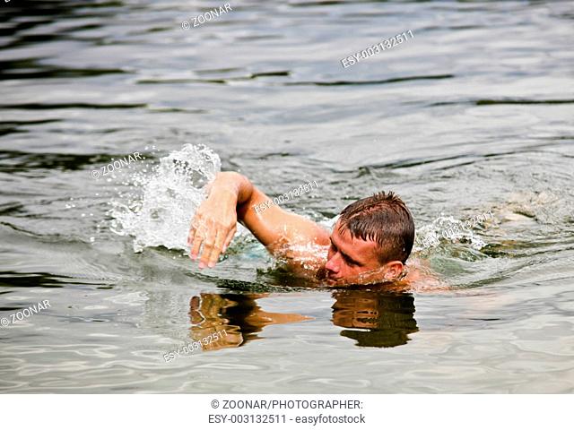 Photo Of A Young Man Having A Cool Summer Swim