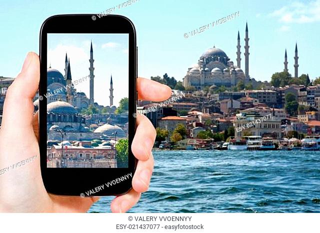 tourist taking photo of Istanbul skyline
