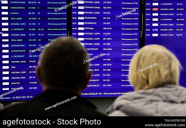 RUSSIA, SOCHI - NOVEMBER 2, 2023: Passengers read flight information boards at Sochi International Airport named after Soviet cosmonaut Vitaly Sevastyanov...