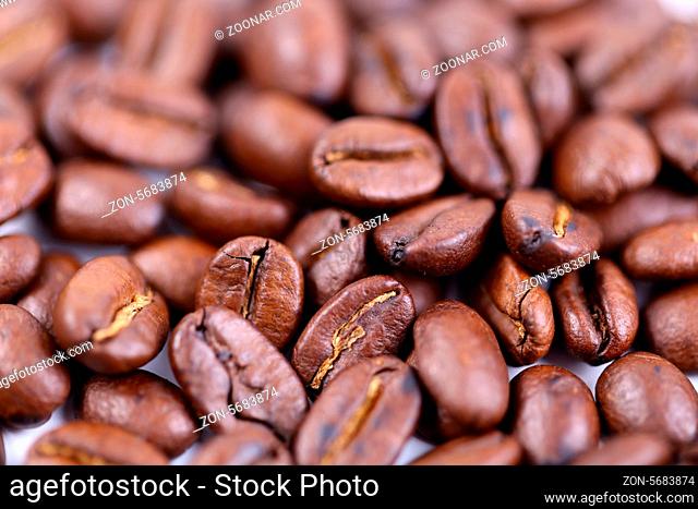 Roasted coffee beans, can be used as a background. Close up
