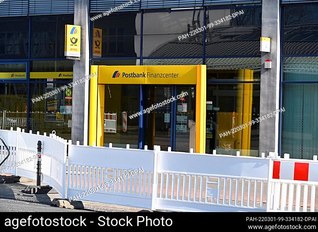 27 February 2022, North Rhine-Westphalia, Cologne: Postbank Finance Center, Deutsche Post, entrance behind a construction site Photo: Horst Galuschka/dpa/Horst...