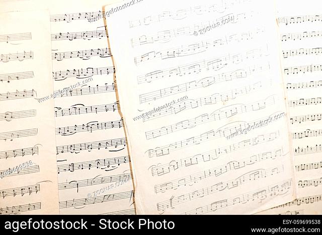 Tashkent, Uzbekistan - October 6, 2018. The work of the Uzbek folk composer Yunus Rajabi. Vintage sheet of paper with handwritten musical notes