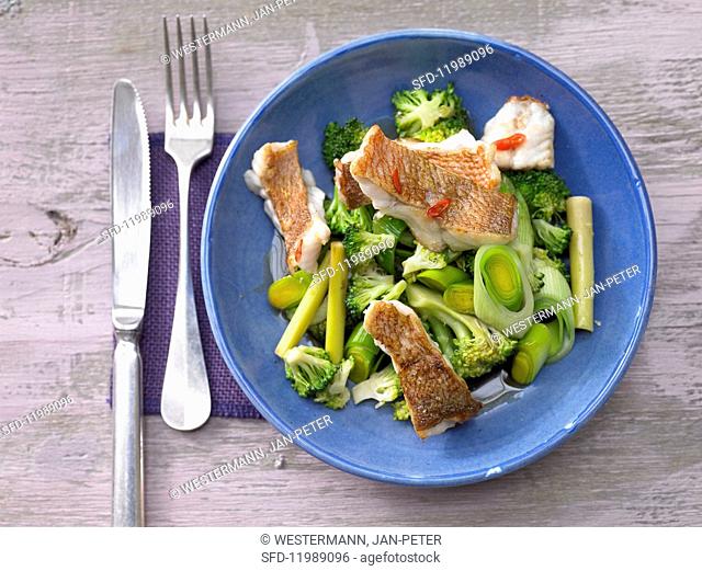 Chilli-infused rose fish with broccoli and lemongrass