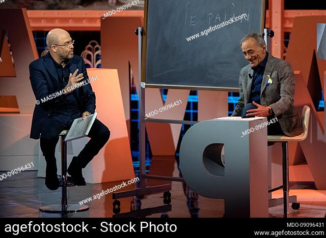 Italian journalist Massimo Gramellini and Italian singer Roberto Vecchioni participate in the television program Le Parole of Rai 3