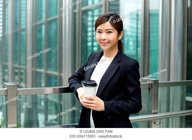 Business woman hold with coffee